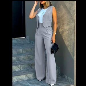 Vest and dress pants for women with front side pockets.